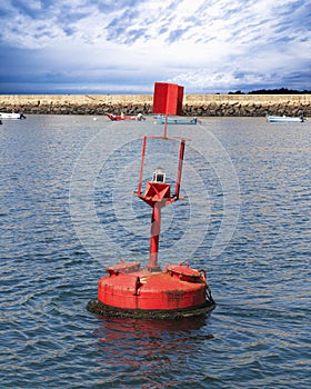 Red buoy in the sea