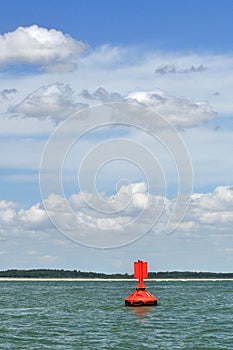 Red buoy at the sea