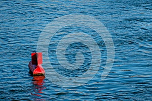 Red buoy water surface