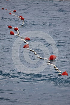 Red buoys in the sea to separate zones