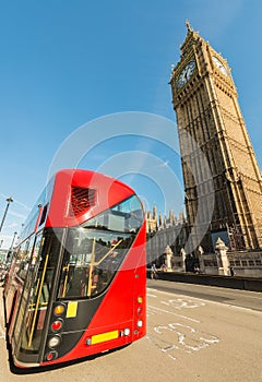 Red bus in front of Big Ben - London - UK