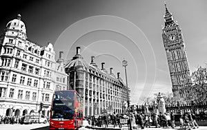 Red bus in Lodon street view with Big Ben in panorama , black and white