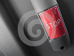 A red bus stop request button