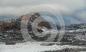 Red Butte Blanketed In Fog and Snow Along Kolob Terrace Road In Zion