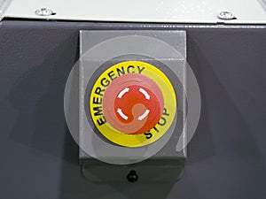 Red button Emergency stop on industrial equipment. Termination and stopping concept.