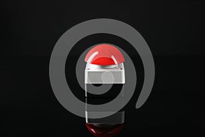 Red button of nuclear weapon on black background. War concept