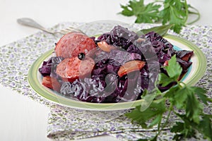 Red cabbage with fried sausage