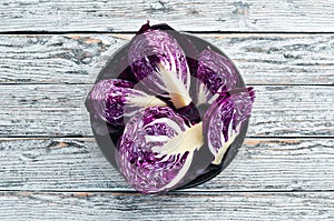 Red cabbage. Purple cabbage on a white wooden background. Organic food.