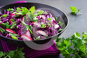 Red cabbage, radish and spring onion salad