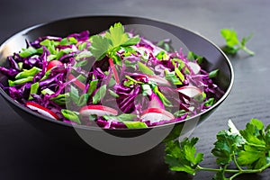 Red cabbage, radish and spring onion salad