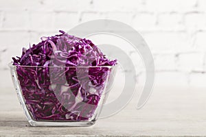 Red cabbage salad with fresh green onions dill and sprouted mung beans on a white background. Vegetarian dish. Top view. Concept o