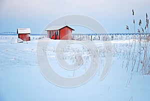 Red cabins in winter