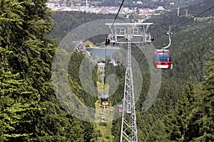 Red Cable car on green