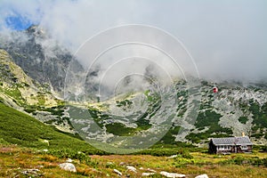 Red cable car from the Tatra Mountains to the Lomnicky Peak. Beautiful mountain landscape in Slovakia.