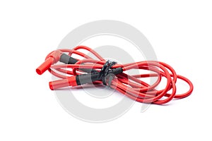 Red cable of multimeter on white background