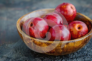 Red camu camu fruit in a bowl. Camu camu is a south American fruit photo