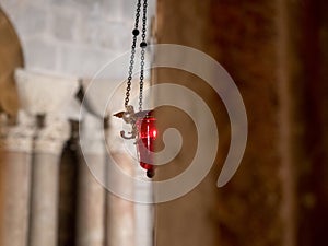 Red candle at the Church of Holy Sepulchre, Jerusalem