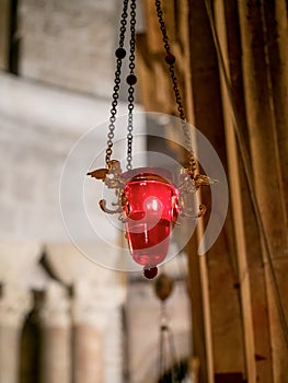 Red candle at the Church of Holy Sepulchre, Jerusalem