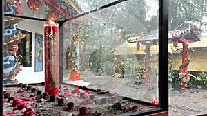 A RED CANDLE FLIGHT WHEN IT RAINS AT THE TEMPLE SUITABLE FOR CHINESE NEW YEAR