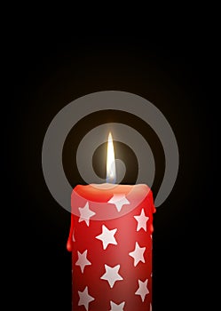 Red Candle with Starlet Texture on Black Background - Isolated C photo