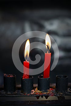 Red candles on a candlestick