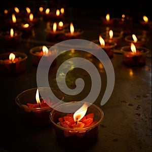 Red candles illuminated in the evening for Christmas or asian festivals