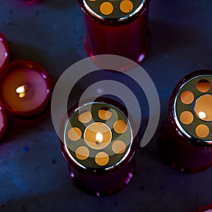 Red candles to remember deceased loved ones