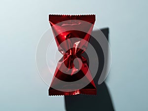 Red candy wrapper isolated on white background