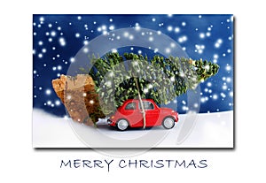 Red car carrying christmas tree with snowflakes