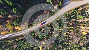 Red Car In A Colorful Forest - Bird\'s Eye View