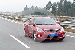 Red car on highway