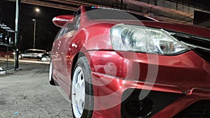 Red Car Parking and white wheel