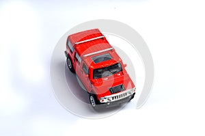 RED car white background indoor