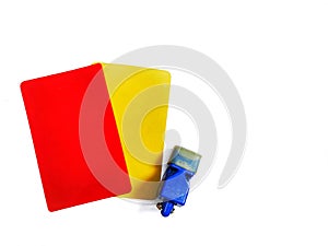 Red cards, yellow cards and blue whistles are placed on a white background