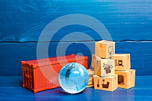 Red cargo container with boxes and blue globe of planet Earth. Global international trade in goods. World economy, economic ties.