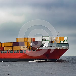 Red cargo container ship