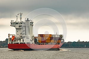 Red cargo container ship