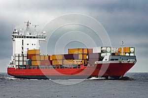 Red cargo container ship