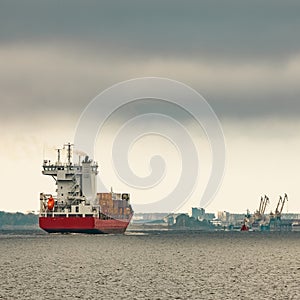 Red cargo container ship