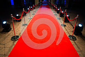 Red carpet with barriers and red ropes