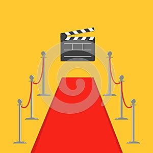 Red carpet and rope barrier golden stanchions turnstile Clapper movie cinema board. template Yellow background. Flat desi