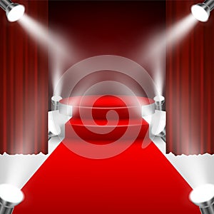 Red carpet to podium stage with spotlights and red curtain