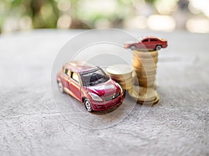 Red cars with golden coins pile, business cars, Insurance, rent concept