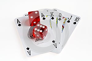 Red Casino Dice on Poker Hand