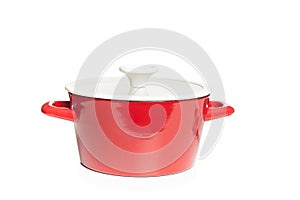 Red cast iron cooking pot, on white background.
