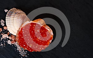Red caviar in seashell
