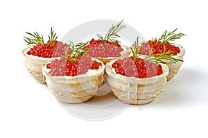 Red caviar in tartlet, isolated over white