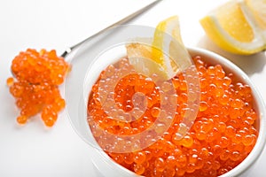 Red caviar witl slice lemon
