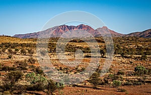 Red centre landscape with distant view of Mount Sonder NT outback Australia