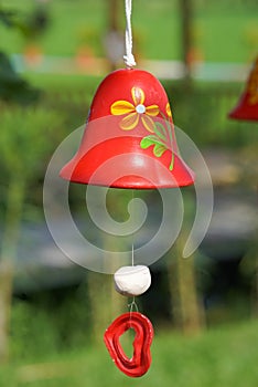 Red ceramic bells hanging